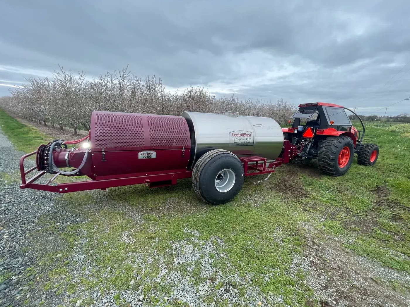 Air-blast application rig staged in an orchard