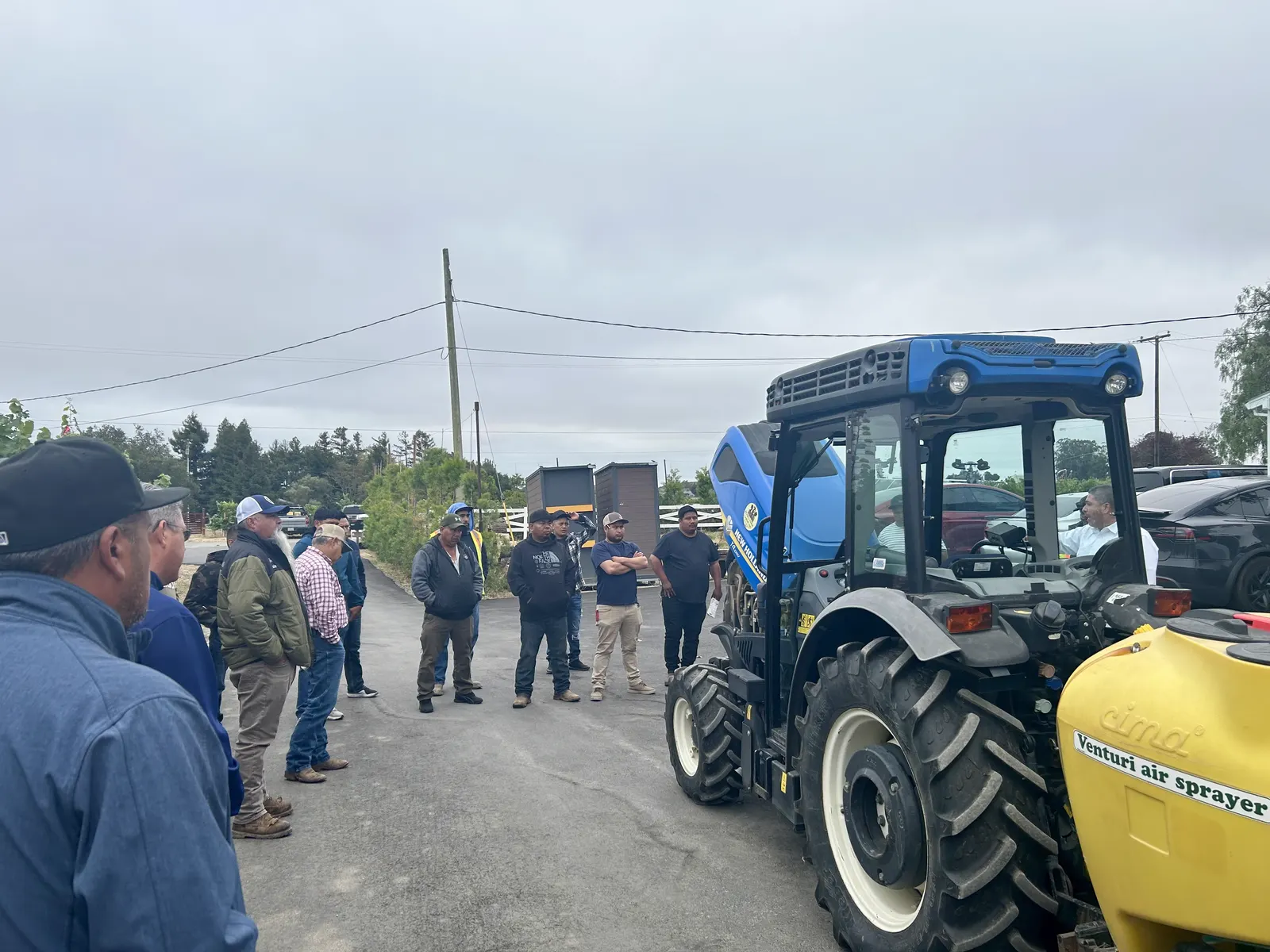 Crew members participating in sprayer equipment training